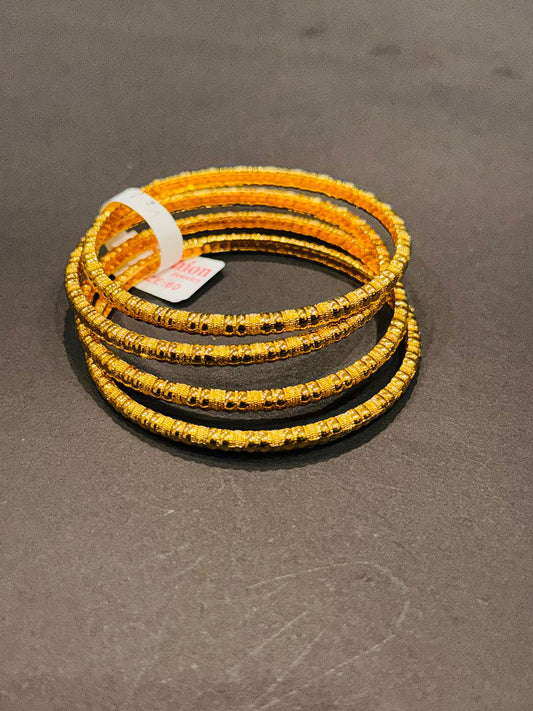 Golden Ripple Stack Bangles (Set of 4) - GEN Z JEWELRY